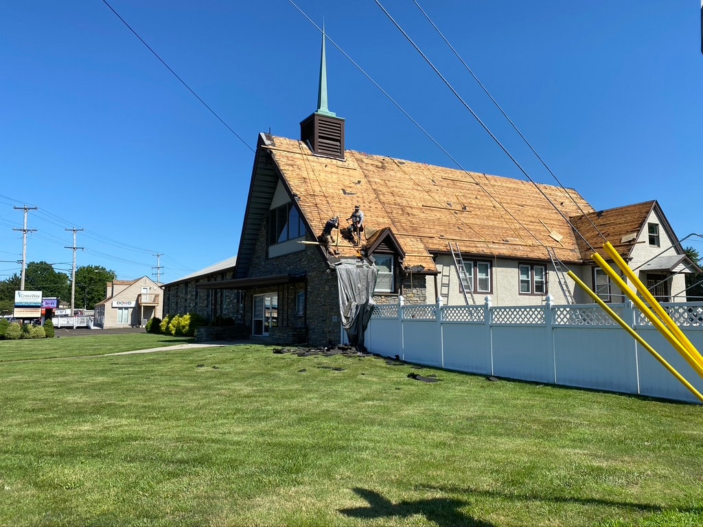 Decking exposed during tear-off on Crossway Community Church roof