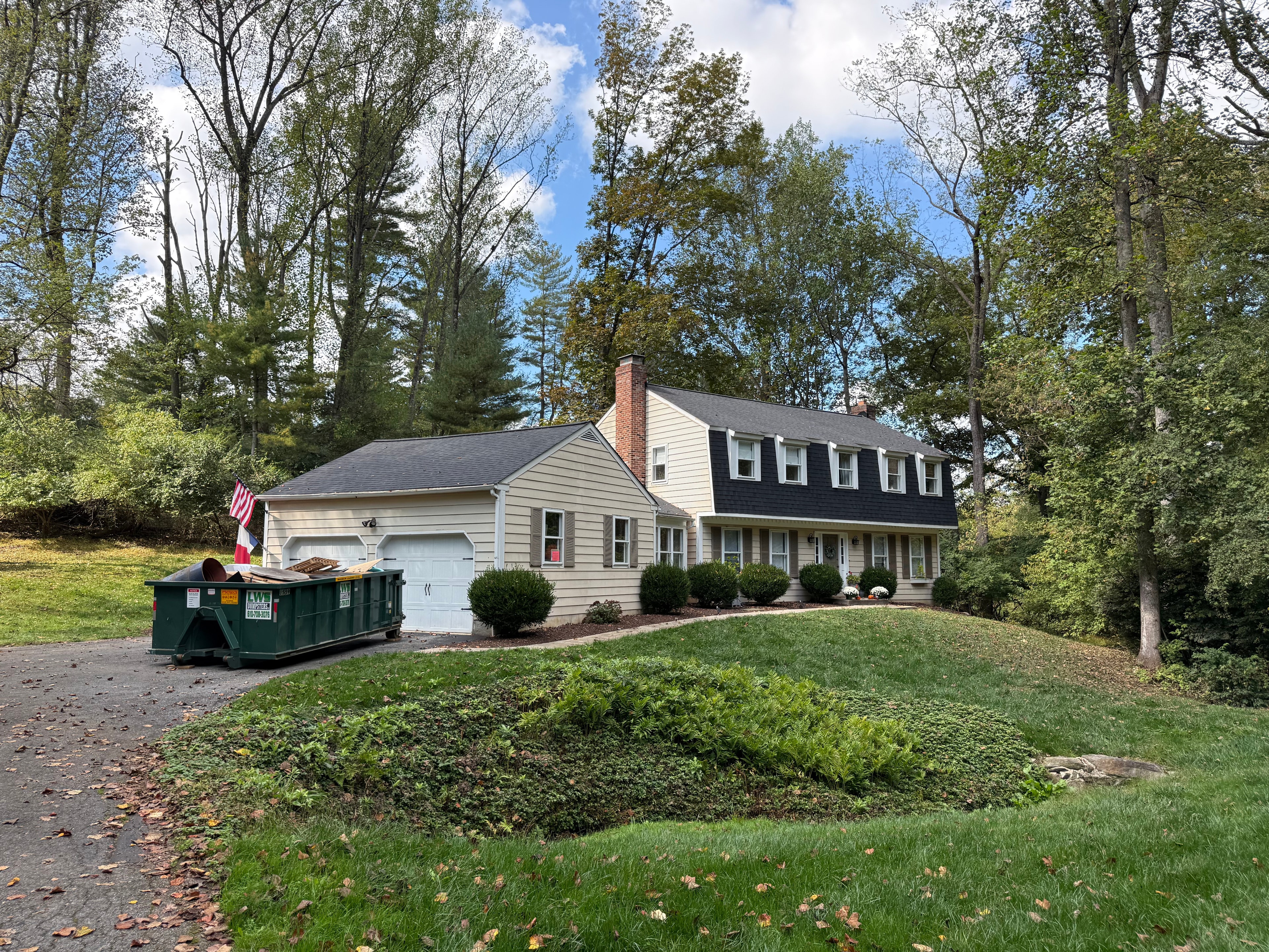 Completed CertainTeed Landmark Moire Black roof on Newtown Square home, front view