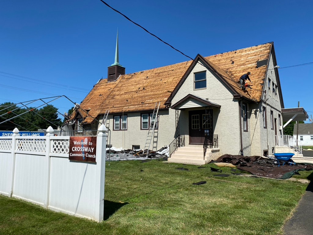 Crossway Community Church during roof tear-off and installation